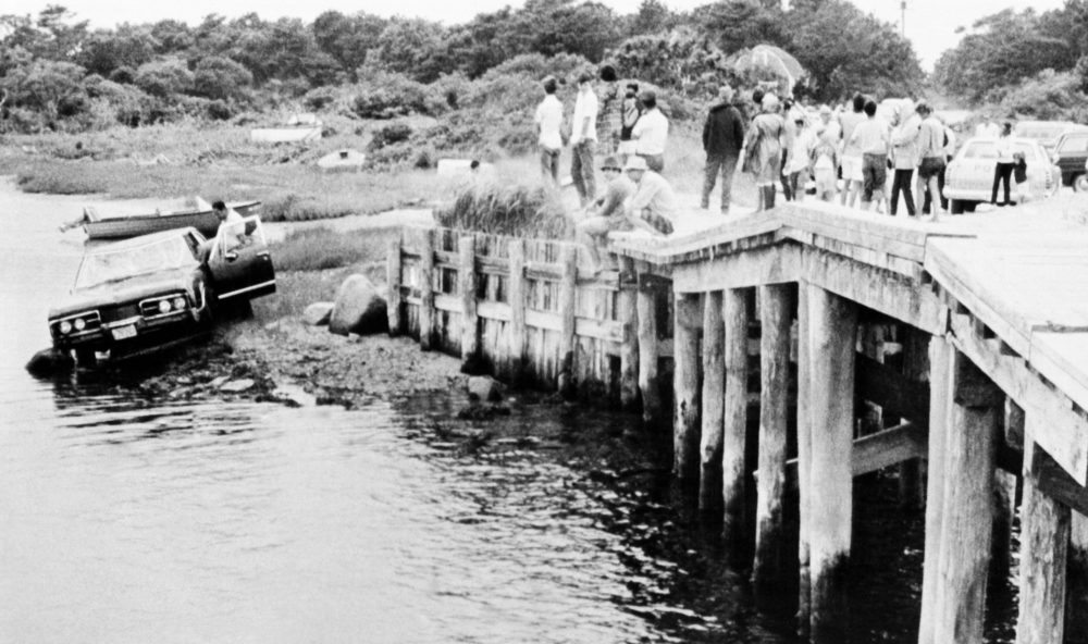 On July 19, 1969, Sen. Edward Kennedy's car is pulled from water by a bridge in Edgartown, Mass. The body of Mary Kopechne of Washington, D.C., was found in the rear seat. Her death was attributed to drowning. (AP)