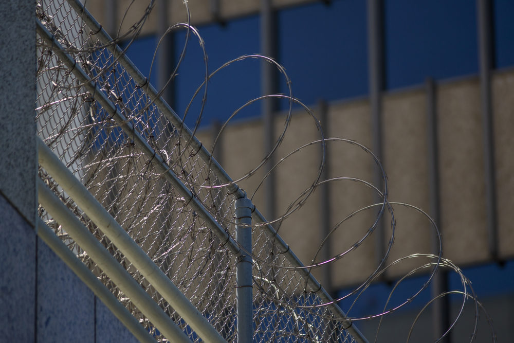 Razor wire is seen on the Metropolitan Detention Center prison. (David McNew/Getty Images)