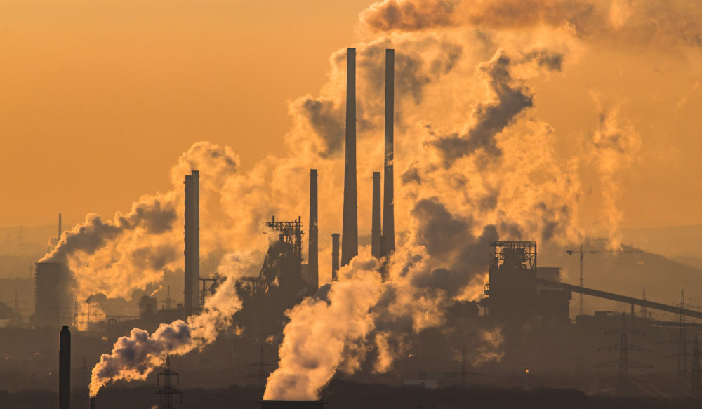 Steam and exhaust rise from a chemical company and a coking plant in Oberhausen, Germany. (Lukas Schulze/Getty Images)