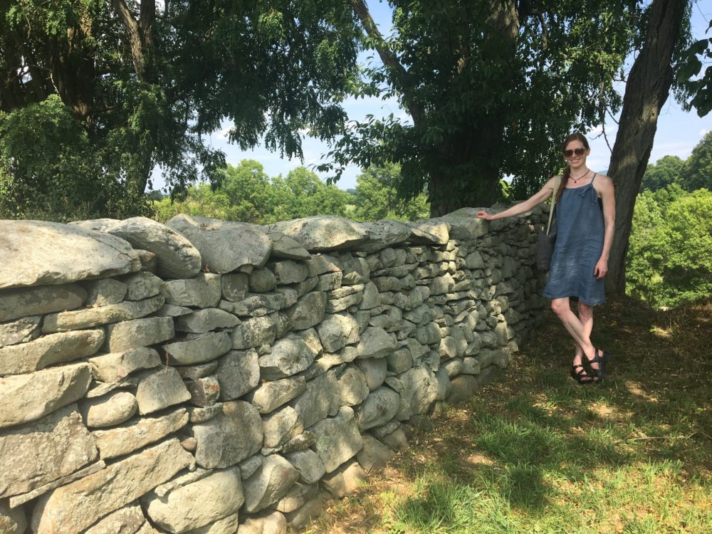The author at "Storm King Wall," Andy Goldsworthy's piece at the Storm King Art Center. (Courtesy Andrea Shea)
