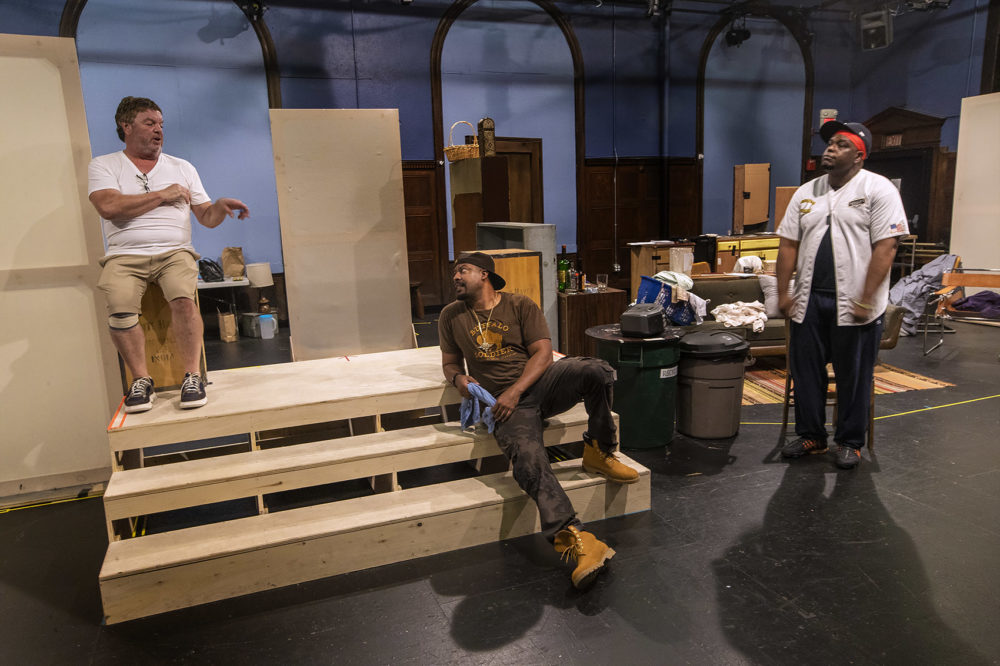 John Scurti as Gerry, Morocco Omari as Lamont, and J. Bernard Calloway as Mr. Bugz rehearse the opening scene of "The Purists." (Jesse Costa/WBUR)