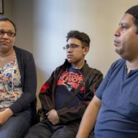 Mariela and Gary Sanchez, and their son Jonathan, entered the U.S. in 2016 on tourist visas. Sixteen-year-old Jonathan gets treatment for cystic fibrosis at Boston Children’s Hospital. (Robin Lubbock/WBUR)