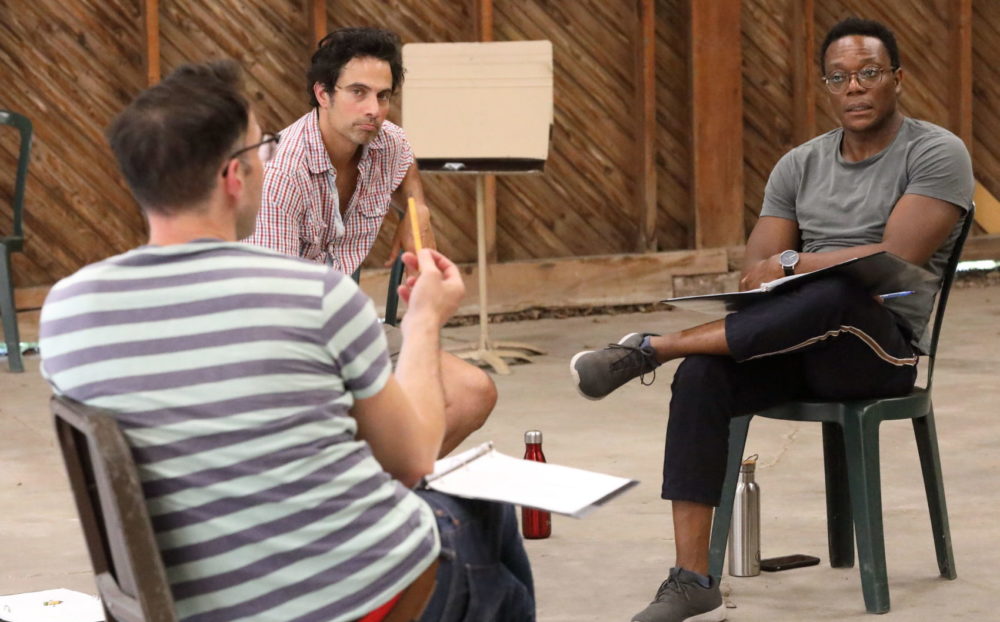 Bill Barclay (left) as Captain de Laclos, David Joseph as Mozart and Chukwudi Iwuji as Chevalier during a rehearsal. (Photo by Hilary Scott)