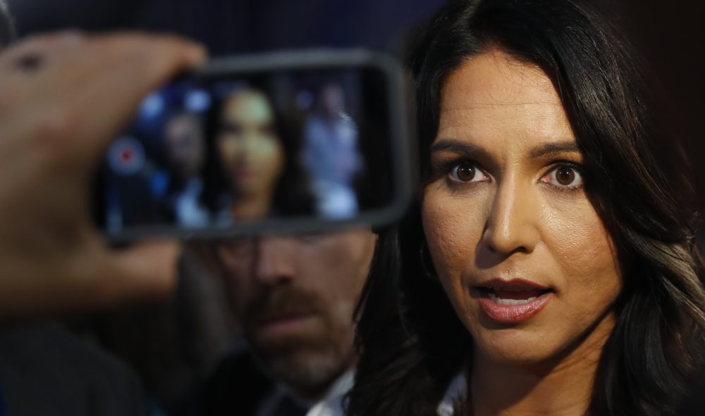 Rep. Tulsi Gabbard, D-Hawaii, answers questions after the second of two Democratic presidential primary debates hosted by CNN Thursday, Aug. 1, 2019, in the Fox Theatre in Detroit. (Paul Sancya/AP)