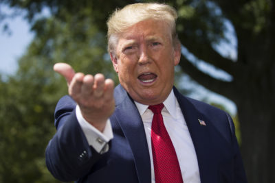 President Trump speaks with reporters before departing on Marine One on the South Lawn of the White House Wednesday. (Alex Brandon/AP)