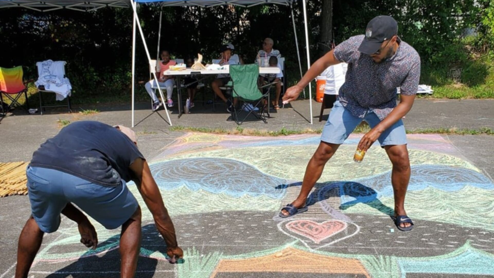 Sidewalk chalk art at #MattapanLove. (Courtesy #MattapanLove)