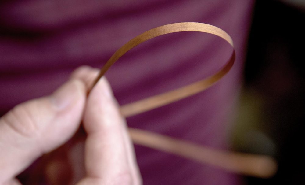 A strip of super conducting tape. (Robin Lubbock/WBUR)