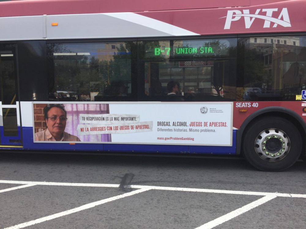 The Massachusetts Department of Public Health has placed ads about problem gambling on buses and social media. (Karen Brown/NEPR)