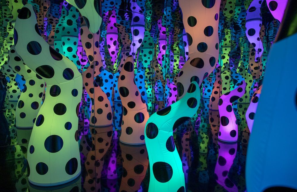 Inside "LOVE IS CALLING," an infinity mirror room by artist Yayoi Kusama at the ICA, Boston. (Robin Lubbock/WBUR)