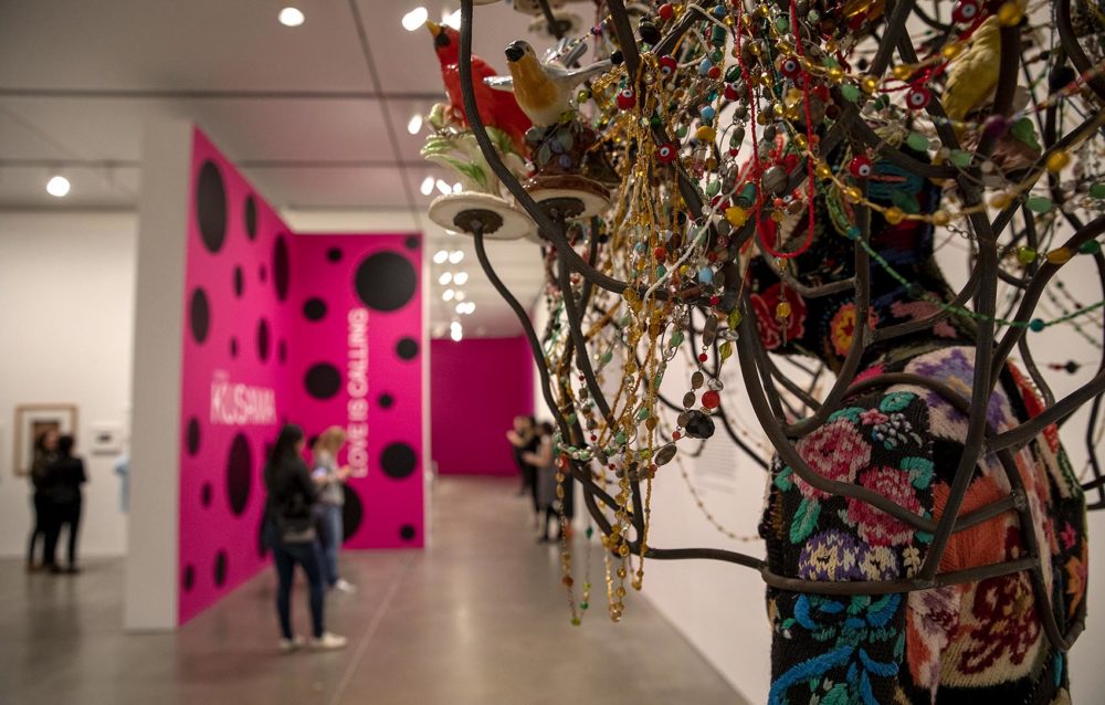 Nick Cave's "Soundsuit," created in 2009, is part of the gallery next to Kusama's infinity room showing how she's influenced contemporary art. (Robin Lubbock/WBUR)