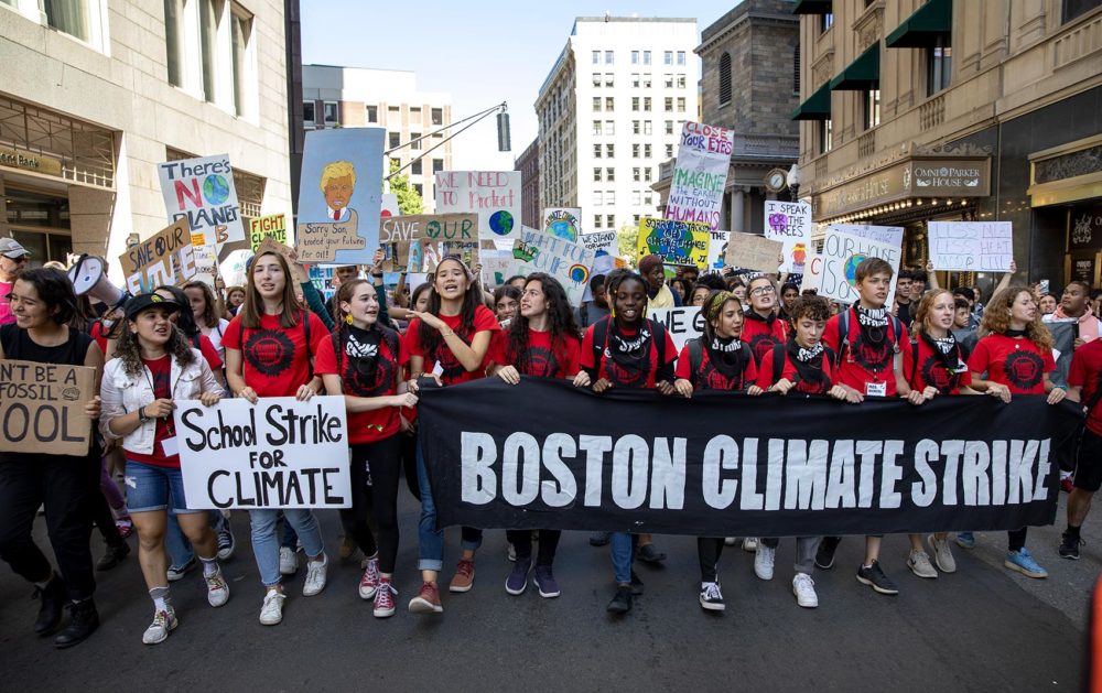 Youth climate strike protesters march through Boston toward the State House in September 2019. (Robin Lubbock/WBUR)