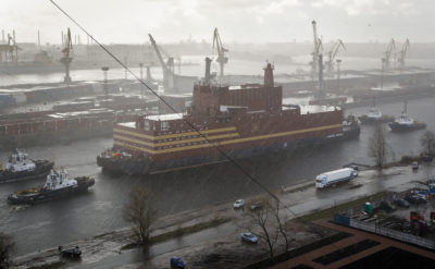 Floating nuclear power plant 'Akademik Lomonosov' is towed out of the St. Petersburg, Russia shipyard where it was constructed in St. Petersburg, Russia. (Dmitri Lovetsky/AP)
