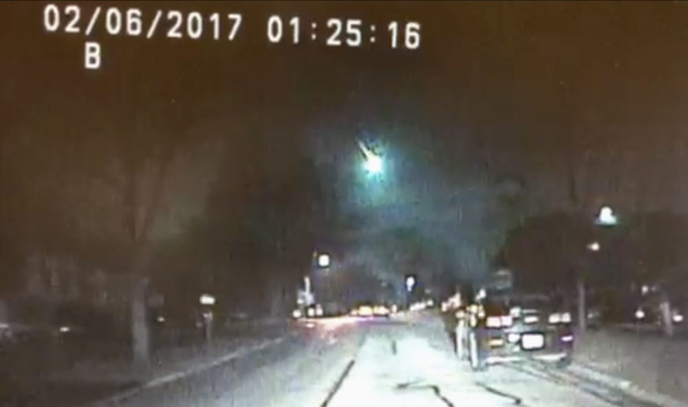 The meteorite as it streaked over Lake Michigan early in the morning on Feb. 6, 2017. (Lisle, Illinois Police Department via AP)
