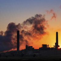 In this July 27, 2018, file photo, the Dave Johnson coal-fired power plant is silhouetted against the morning sun in Glenrock, Wyo. (J. David Ake/AP)