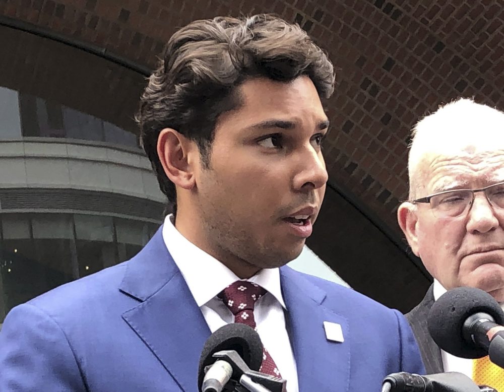 Fall River Mayor Jasiel Correia speaks beside his attorney Kevin Reddington outside the federal courthouse, Sept. 6, 2019, in Boston. (Philip Marcelo/AP)