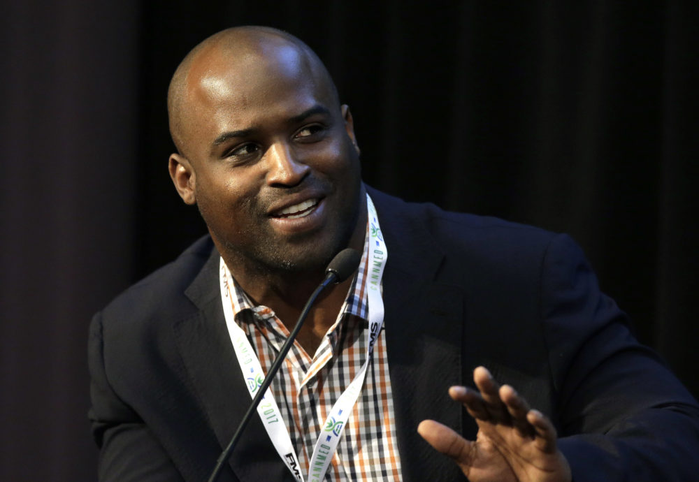 Former NFL running back Ricky Williams speaks at a conference on medical marijuana at Harvard Medical School in 2017. (Steven Senne/AP)