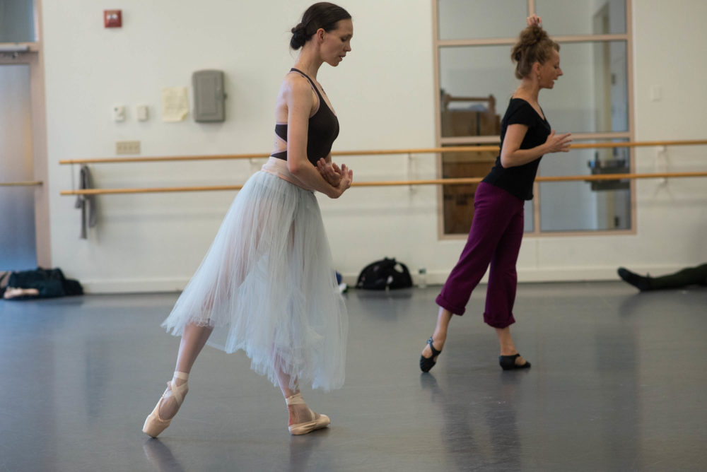 Larissa Ponomarenko (back right) works with Viktorina Kapitonova in rehearsal for "Giselle." (Courtesy Brooke Trisolini/Boston Ballet)