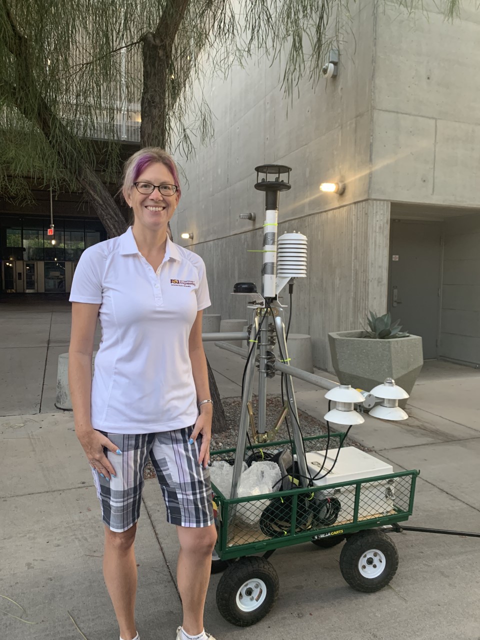 Professor Adriane Middel with MaRTy, a heat robot that monitors the impact of extreme heat. (Tonya Mosley/Here & Now)