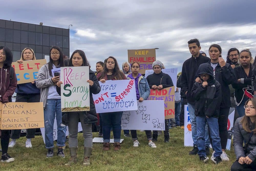 Immigrant advocates and members of Massachusetts’ Southeast Asian communities gathered outside of the Burlington office of U.S. Immigration and Customs Enforcement to protest against planned detentions of Cambodians. (Shannon Dooling/WBUR)