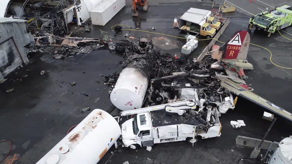 This image taken from a National Transportation Safety Board video shows damage from a World War II-era B-17 bomber plane that crashed Oct. 2 in Windsor Locks, Conn. (Courtesy NTSB)
