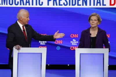 Democratic presidential candidate former Vice President Joe Biden gestures toward Sen. Elizabeth Warren, D-Mass., during a Democratic presidential primary debate at Otterbein University Tuesday in Westerville, Ohio. (John Minchillo/AP)