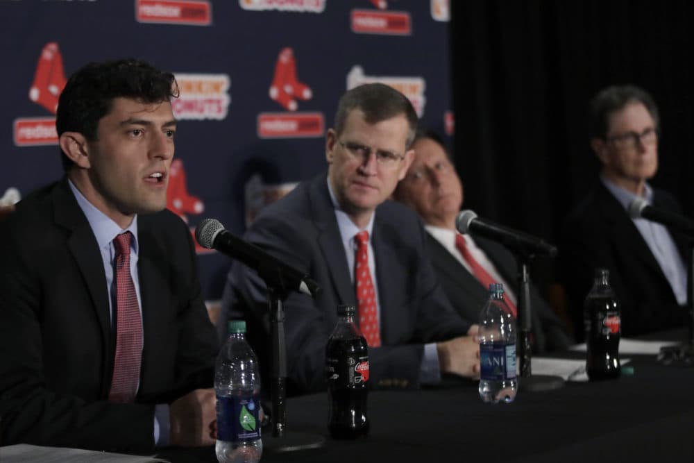 Chaim Bloom, far left, speaks at a news conference as, from left, team president and CEO Sam Kennedy, team chairman Tom Werner and team principal owner John Henry listen. (Elise Amendola/AP)
