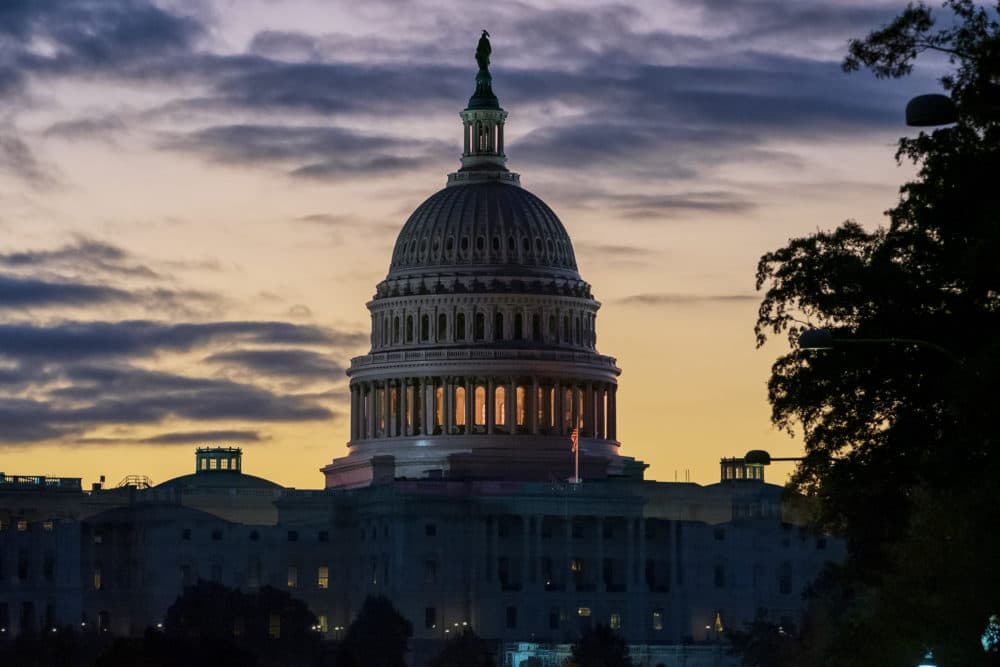 The Capitol is seen at dawn on the morning after Speaker Nancy Pelosi announced the U.S. House will vote on a resolution to affirm the impeachment investigation, (J. Scott Applewhite/AP)
