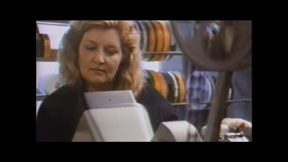 Sound editor cuts "Top Gun" on a Moviola. (Courtesy Matson Films)