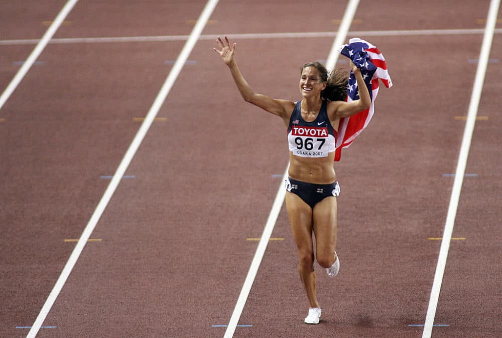 USA's Kara Goucher celebrates after the women's 10,000m at the 11th IAAF World Athletics Championships in 2007.  (Kazuhiro Nogi/AFP/Getty Images)