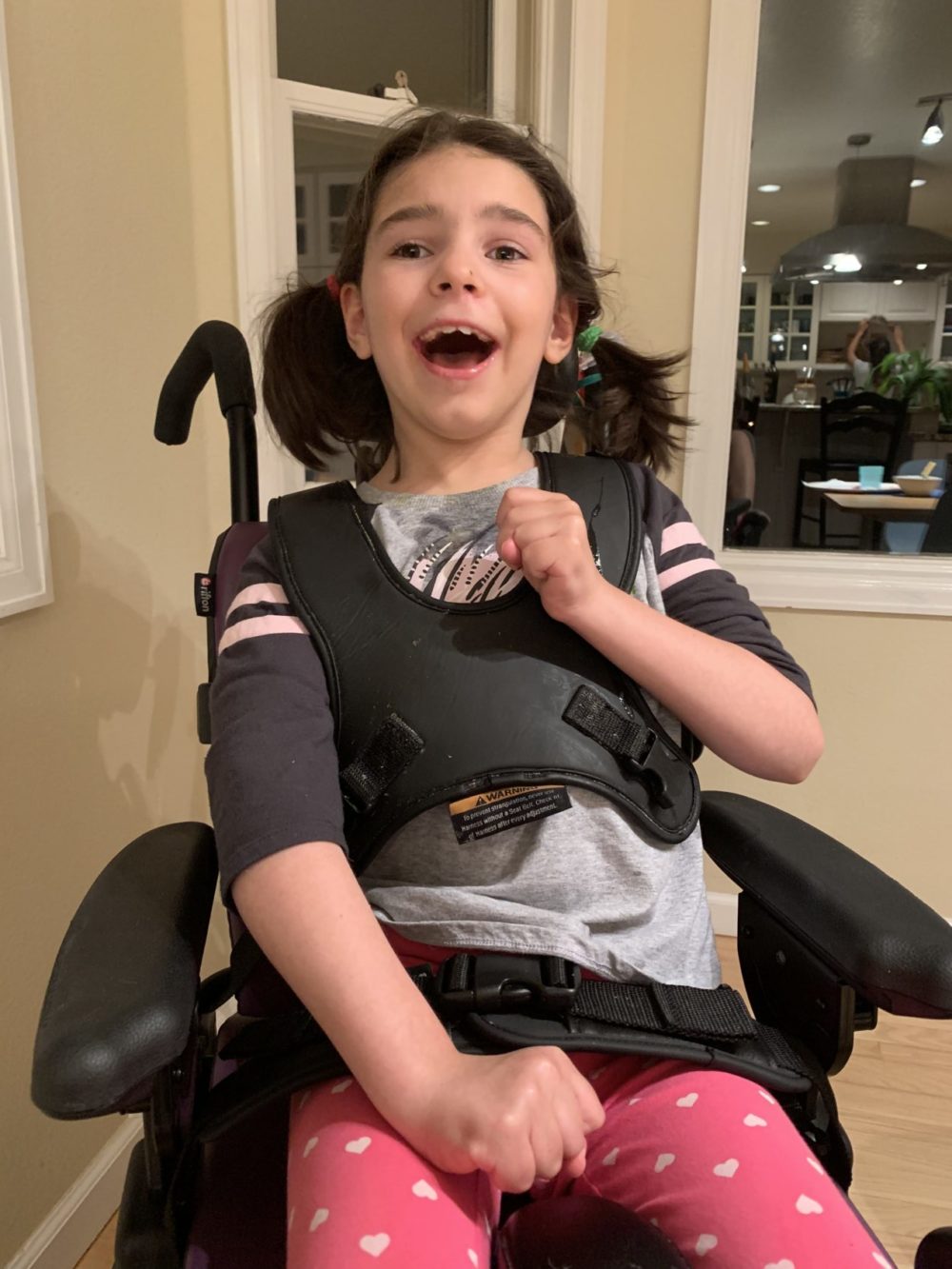 Mila Makovec at home in Colorado after a dose of milasen. (Courtesy of Julia Vitarello)