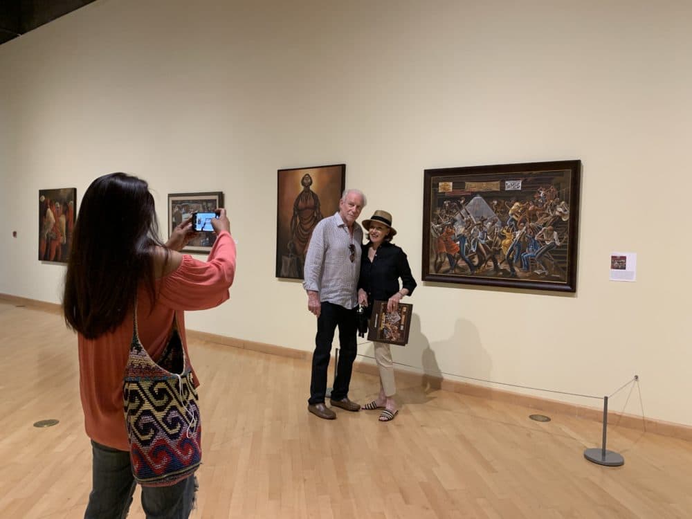 Owners of the iconic "The Sugar Shack" painting, Jeanine and Jim Epstein. (Tonya Mosley/Here & Now)