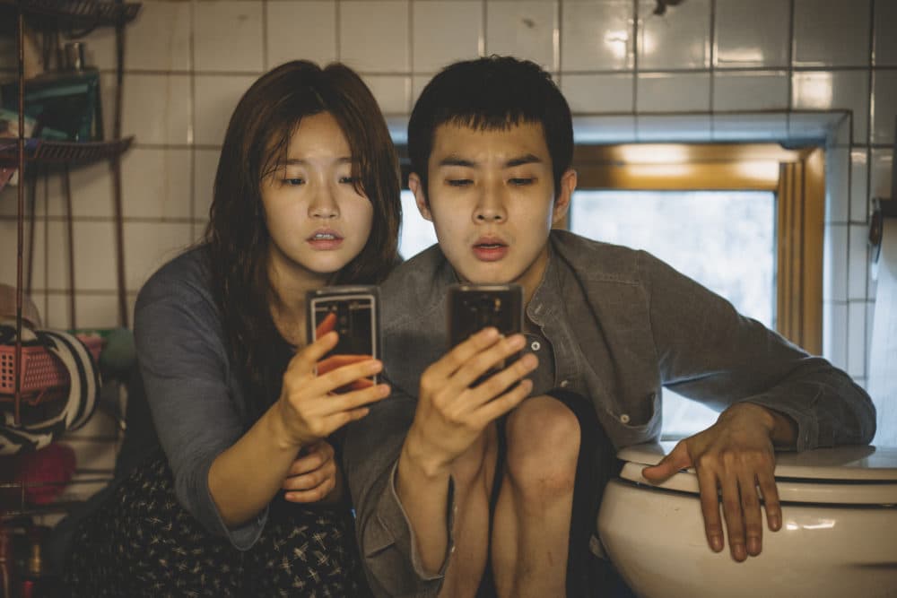 Ki-jung Kim (So-dam Park) and Ki-woo Kim (Woo-sik Choi) in "Parasite." (Courtesy of NEON/CJ Entertainment)