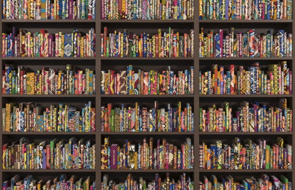 Yinka Shonibare CBE, "The American Library" (detail), 2018. (Courtesy the artist and James Cohan Gallery, New York and FRONT International: Cleveland Triennial for Contemporary Art with funds from VIA Art Fund, Cleveland Public Library and The City of Cleveland Cable television Minority Arts and Education Fund)