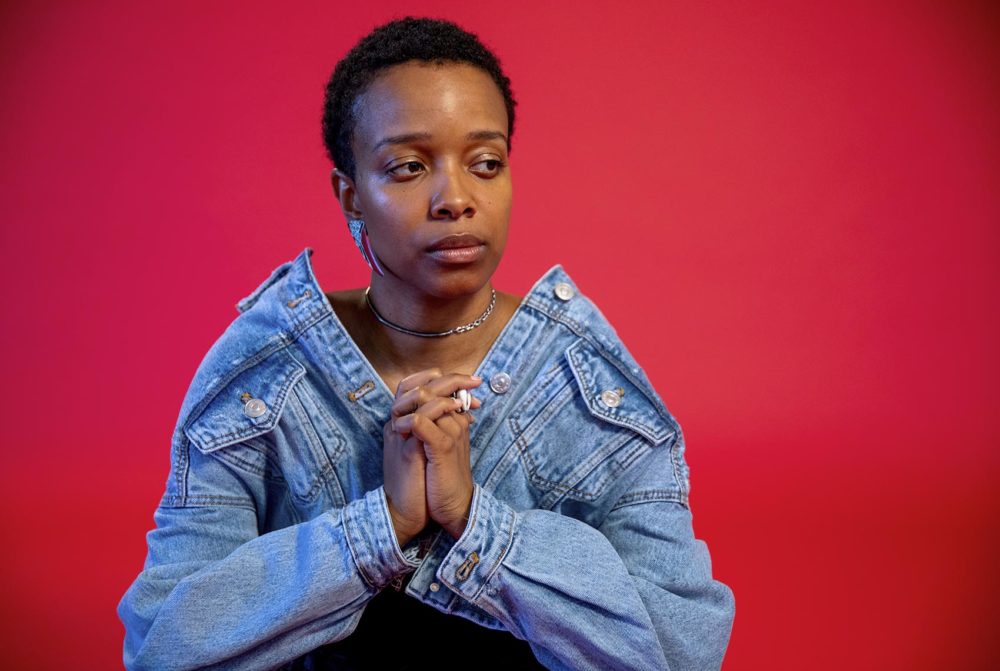 Singer, songwriter and poet, Jamila Woods. (Robin Lubbock/WBUR)