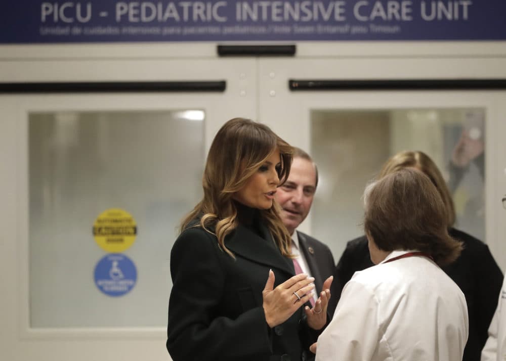 First lady Melania Trump, left, speaks with pediatrician Eileen Costello, front right, as U.S. Secretary of Health and Human Services Alex Azar, behind center, looks on during a visit to Boston Medical Center in Boston on Nov. 6. (Steven Senne/AP, Pool)