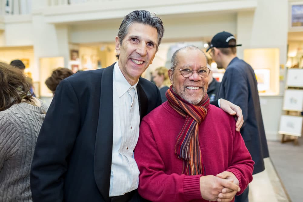 Richard Michelson (left) with artist Jerry Pinkney, at the 2017 children's illustrator exhibit at R. Michelson Galleries in Northampton. (Courtesy of Seth Kaye via R. Michelson Galleries)