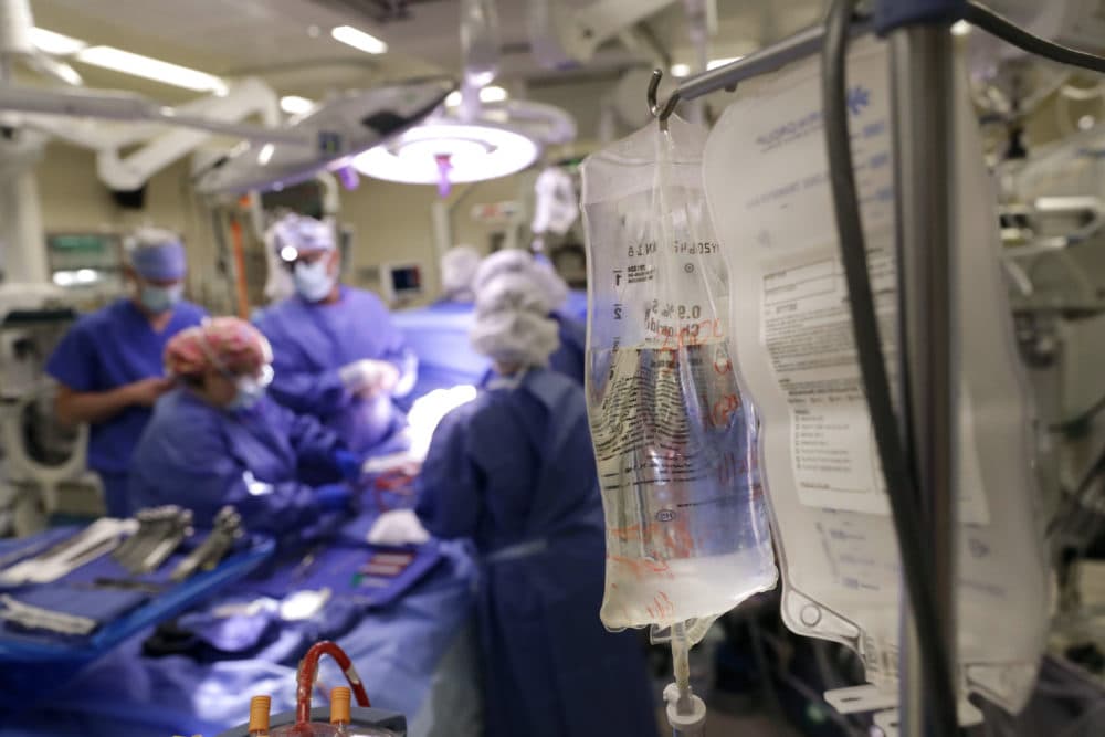 Medical bags hang from a stand during an open heart surgery at the University of Maryland Medical Center in Baltimore. (Patrick Semansky/AP)