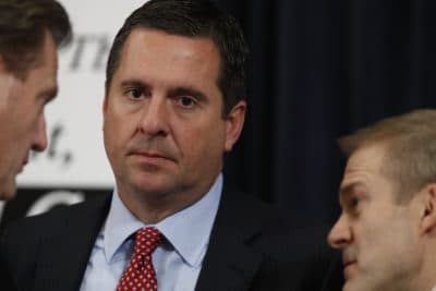 Ranking member Rep. Devin Nunes, R-Calif., left, confers with Rep. Mike Turner, R-Ohio, left, and Rep. Jim Jordan, R-Ohio, during a break in the first public impeachment hearing of President Donald Trump. (Alex Brandon/AP)