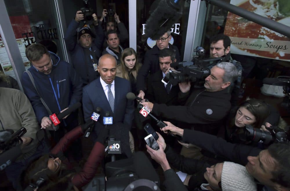 Hours after entering the presidential race, former Massachusetts Gov. Deval Patrick spoke with reporters outside The Bridge Cafe in Manchester, N.H., Thursday. (Charles Krupa/AP)