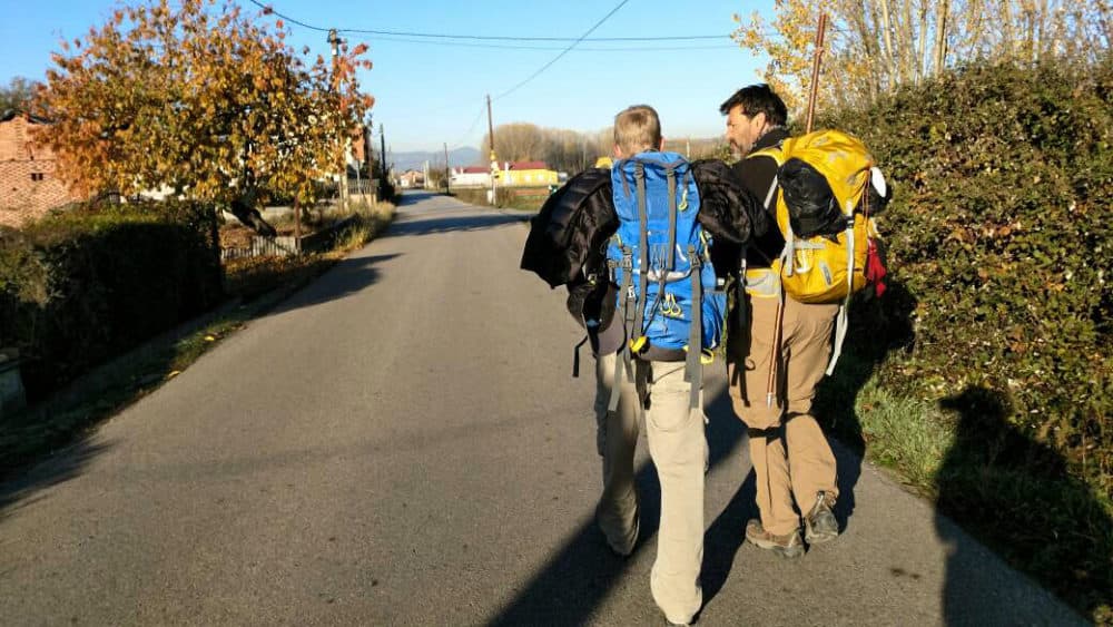 Luke Hutchins and Mark Joseph Peredo walk together on the Camino de Santiago. (Photo by Yan Chen, courtesy Mark Joseph Peredo)