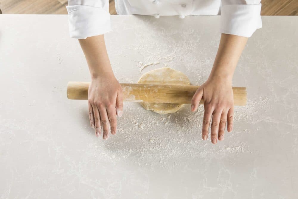 Rolling out a deep-dish apple pie. (Courtesy America's Test Kitchen)