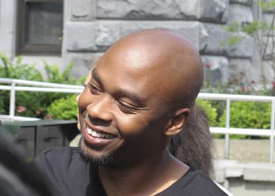 Valentino Dixon outside court in Buffalo, N.Y., Sept.2018, following his exoneration of a murder charge that kept him in prison for 27 years. (Carolyn Thompson/AP)