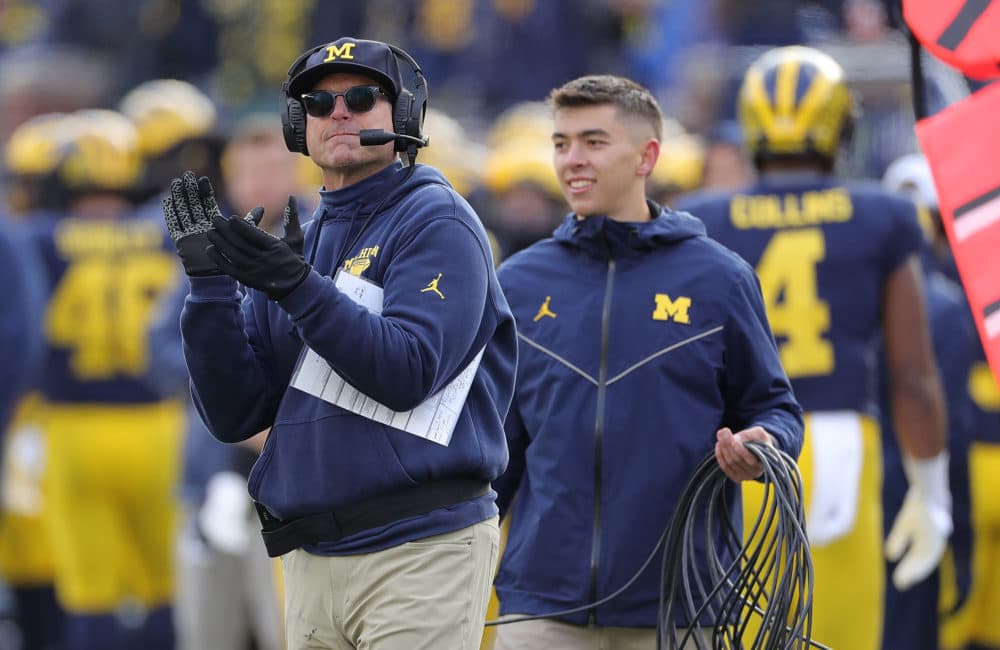Jim Harbaugh was named Michigan's head coach in 2015, before Grant's freshman year. (Leon Halip/Getty Images)