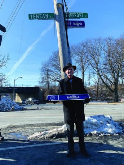 Lou Pasquale in front of the newly dedicated Lou Pasquale Square outside of Boston Bowl. (Daniel Sheehan/Dorchester Reporter)