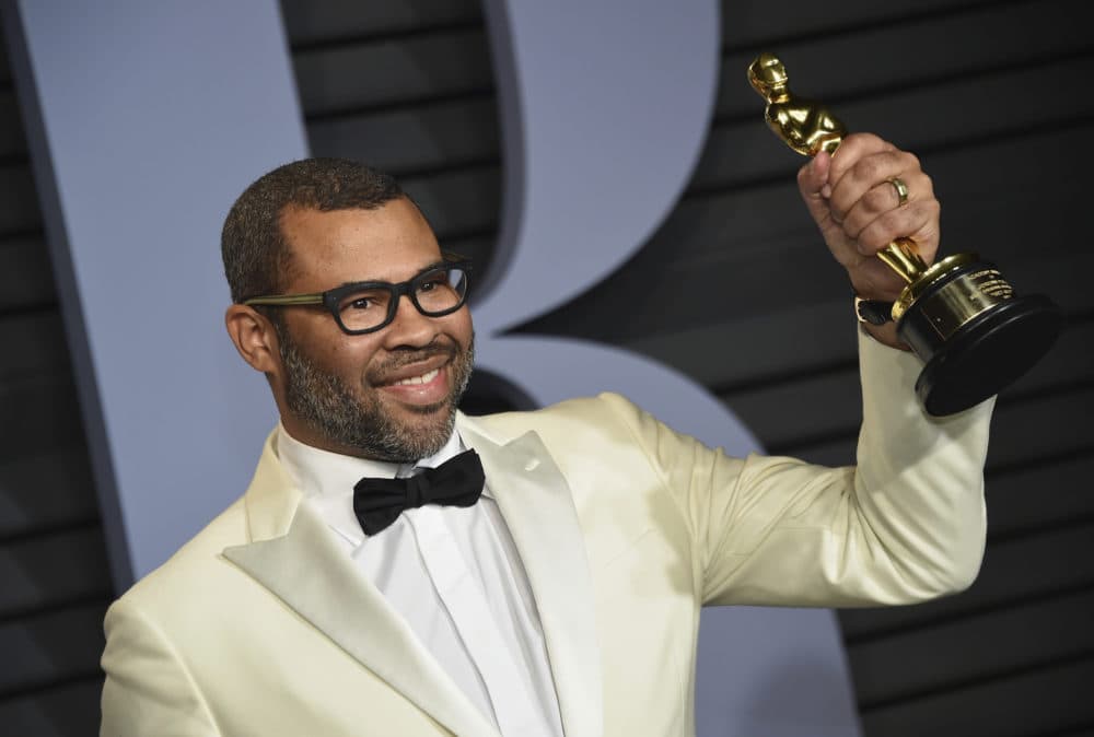 Jordan Peele, winner of the award for best original screenplay for "Get Out," arrives at the Vanity Fair Oscar Party on Sunday, March 4, 2018, in Beverly Hills, Calif. (Photo by Evan Agostini/Invision/AP)