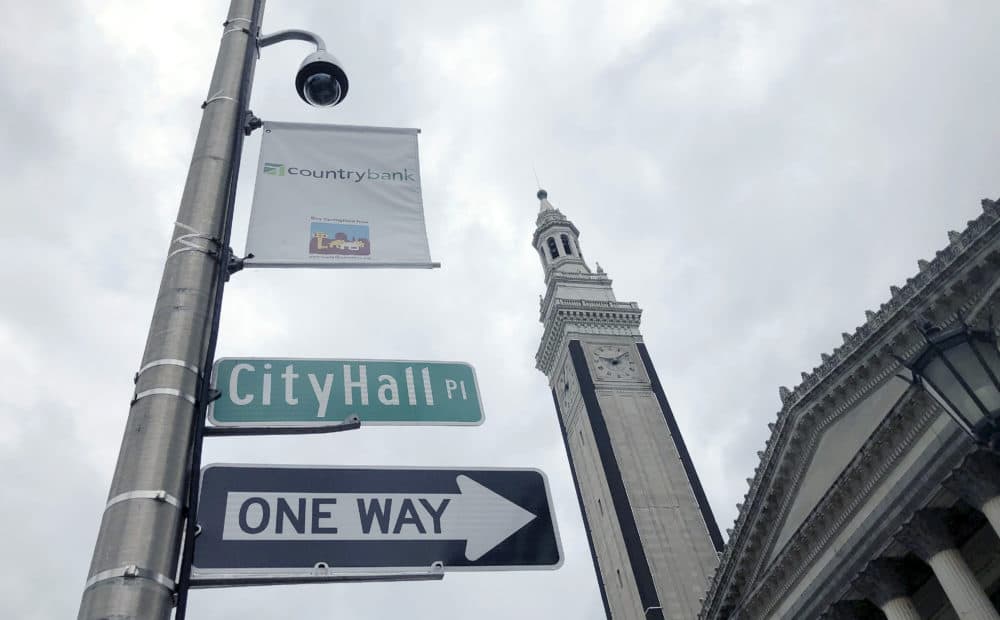 A video surveillance camera hangs on a pole outside City Hall in Springfield, Mass. (Matt O'Brien/AP)