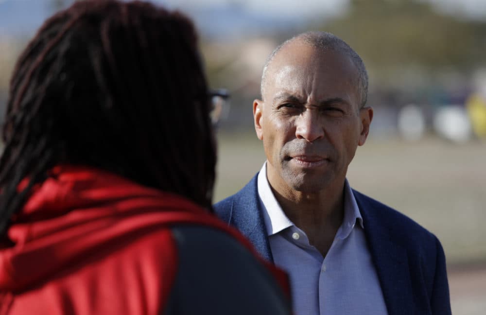 Deval Patrick tours a community garden in Las Vegas. (John Locher/AP)
