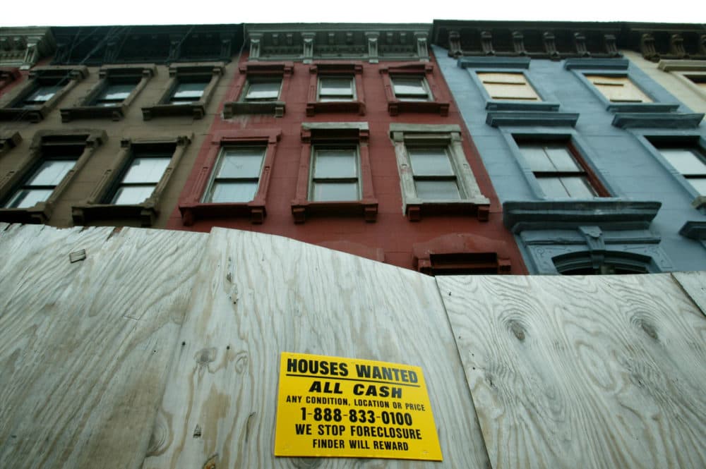 In the Harlem neighborhood of New York City, gentrification has angered many long-time residents, many of who rent their homes and businesses and are being pressured to move out by landlords as rental prices rise. (Chris Hondros/Getty Images)