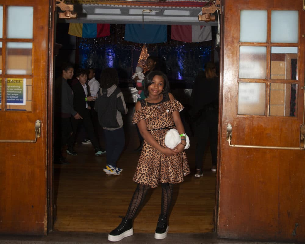 Middle schoolers attend the SneakerBall at the Helen Y. Davis Leadership Academy cafeteria on a recent Friday.