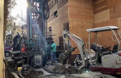 A Gap Mountain Drilling truck at work in Brookline, Mass. (Bruce Gellerman/WBUR)